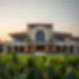 Exterior view of the Jumeirah Golf Estates Club House showcasing its stunning architecture