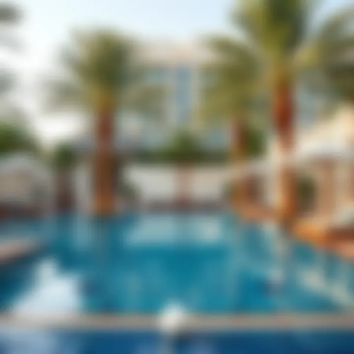 Relaxing pool area surrounded by palm trees at the hotel